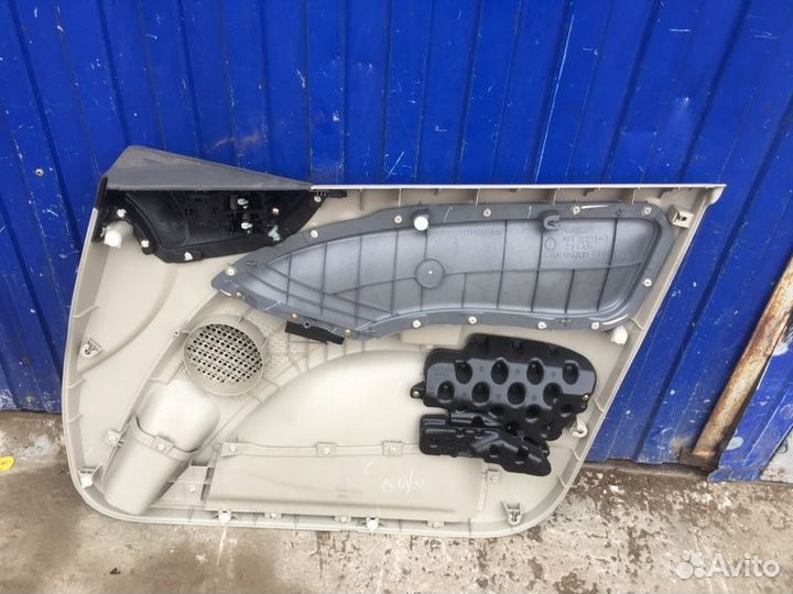 Обшивка двери лев. перед. Mitsubishi Colt