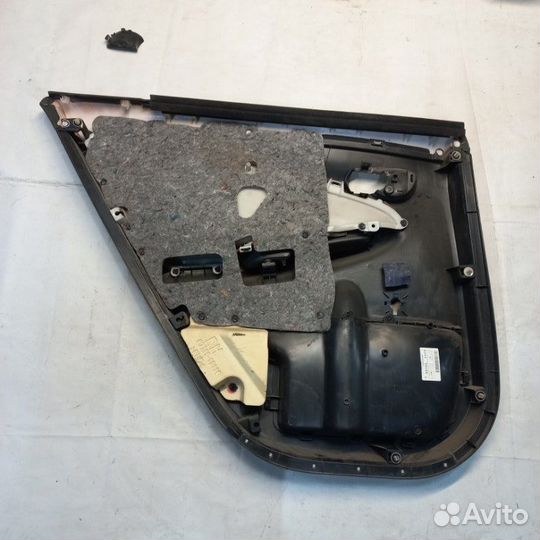 Обшивка двери задняя правая Toyota Corolla E150