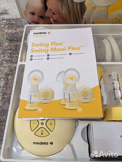 Молокоотсос medela электрический