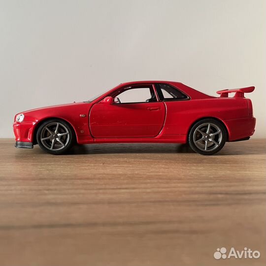 Модель Nissan Skyline GT-R R34 Welly 1:24