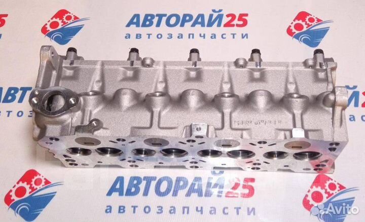 Головка блока цилиндров пустая Mazda R2 Термостат