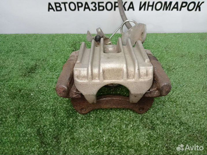 Задний левый суппорт Volkswagen Passat B5