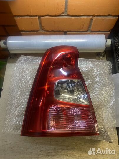 Фонарь задний левый Рено Логан