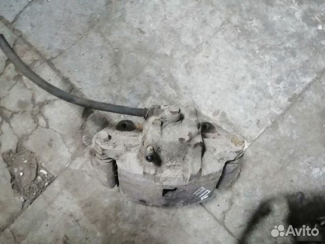 Суппорт тормозной правый Mitsubishi Lancer 9