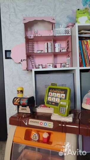 Касса и кукольный домик