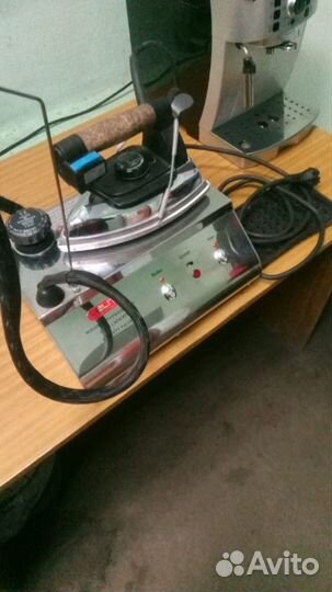 Гладильный стол с парогенератором