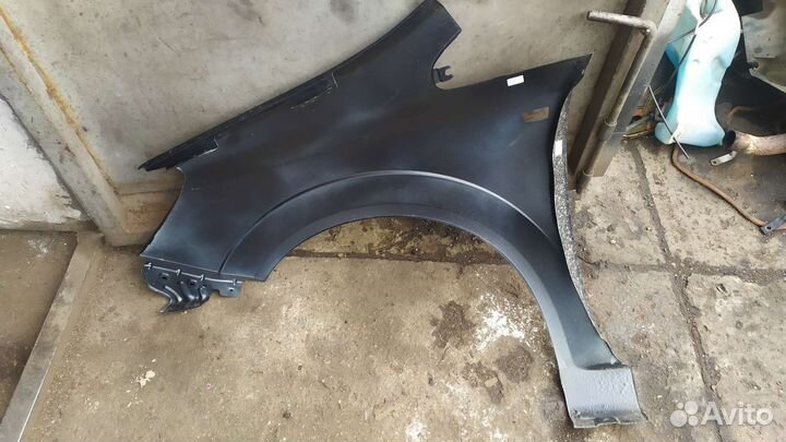 Крыло переднее правое Опель зафира Б 0.8г