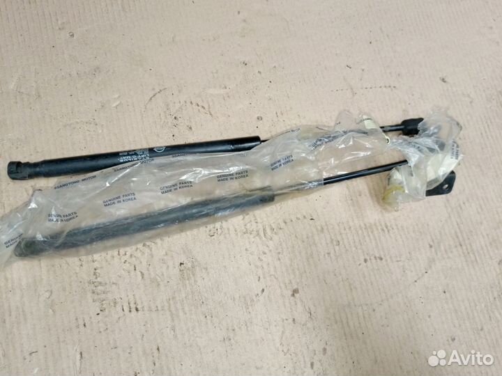 Амортизатор капота Ssangyong Rexton 2006