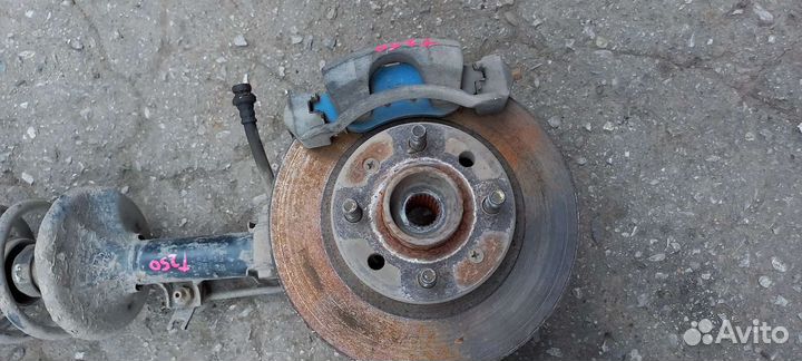 Суппорт тормозной передний Chevrolet Aveo T250