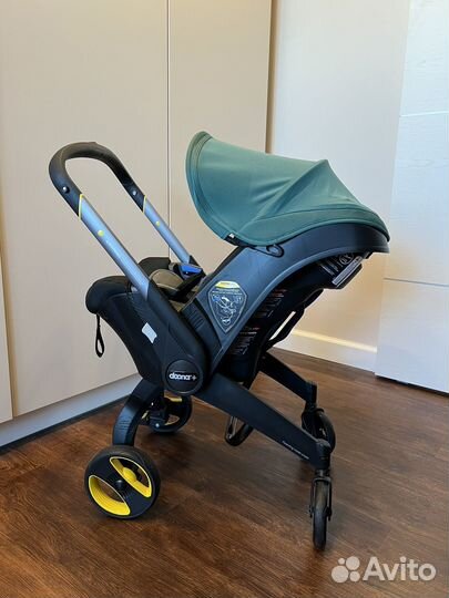 Коляска автокресло doona с базой isofix