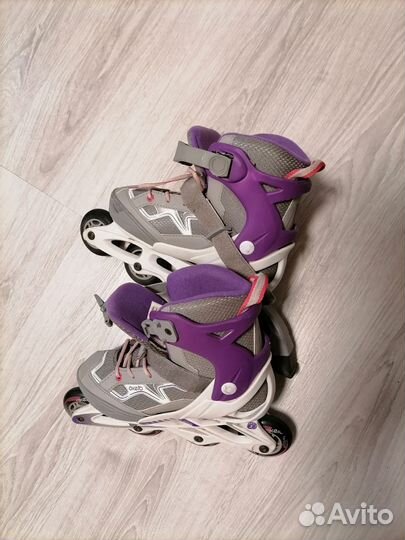 Роликовые коньки