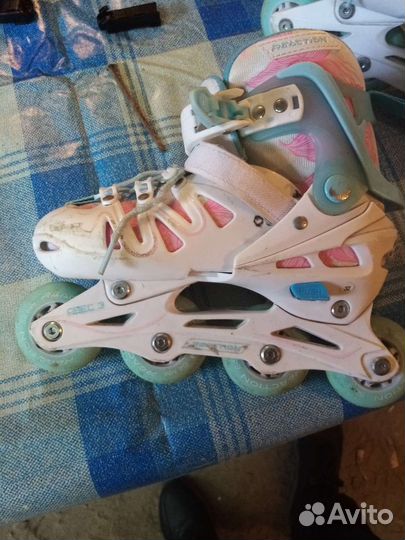 Роликовые коньки