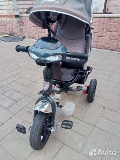 Трехколесный велосипед с ручкой