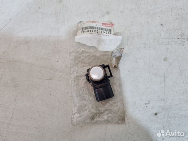 Датчик парковки (парктроник) передний Toyota Land