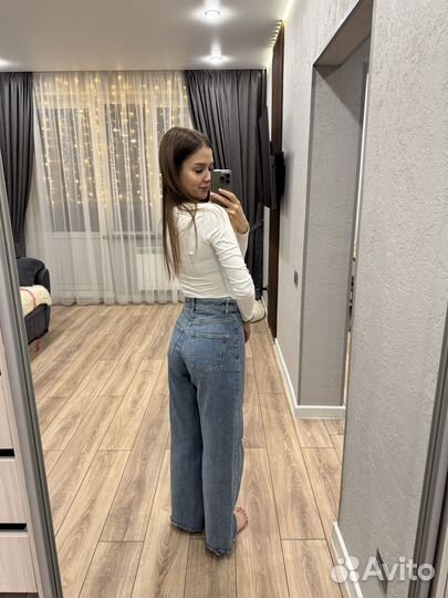 Джинсы широкие mango