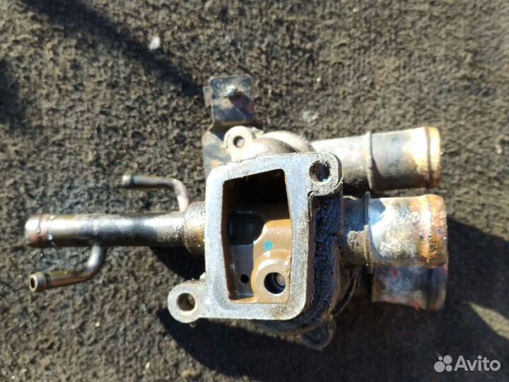 Корпус термостата kia cerato 1