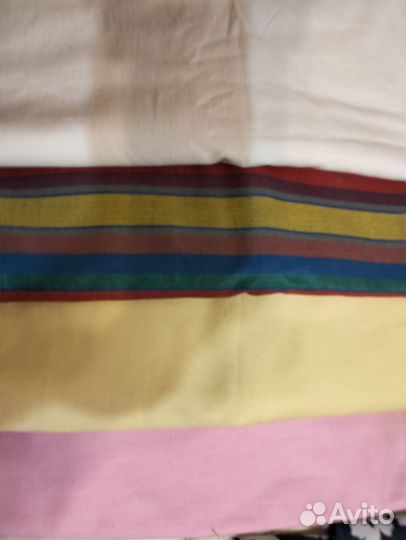 Отрезы тканей, швейные нитки, книга