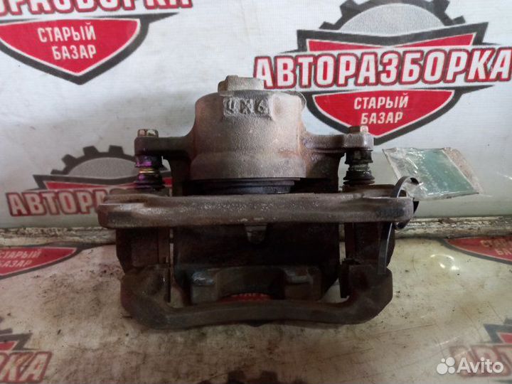 Суппорт тормозной передний правый Toyota Alphard