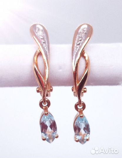 Золотые серьги с бриллиантом