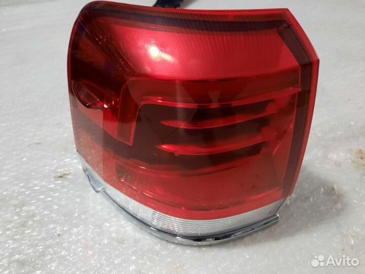 Фонарь наружный задний левый Тoyota Land Cruiser