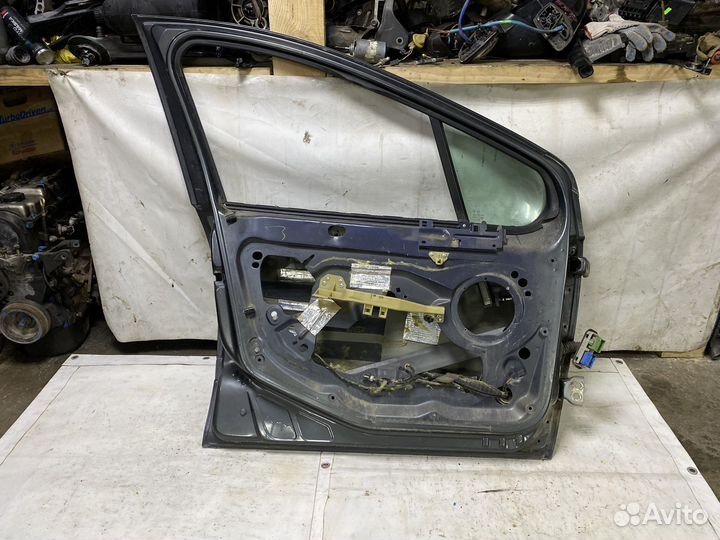 Дверь передняя левая Peugeot 308
