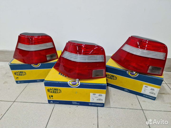 Задний левый Magneti Marelli фонарь VW Golf 4/IV