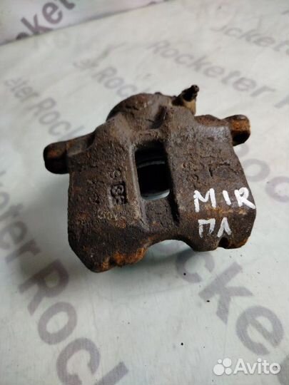 Суппорт тормозной передний левый Mitsubishi Mirage