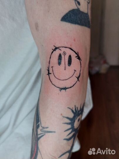 Мастер татуировок