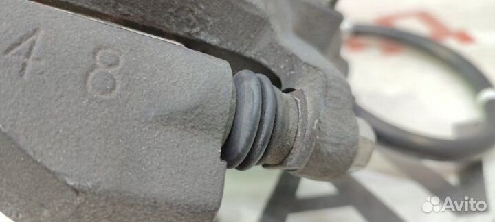 Суппорт тормозной передний левый Mitsubishi