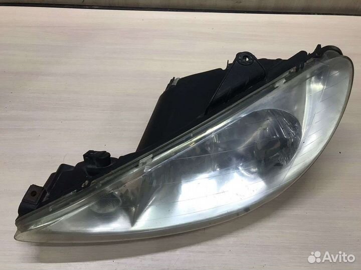 Фара левая Peugeot 206
