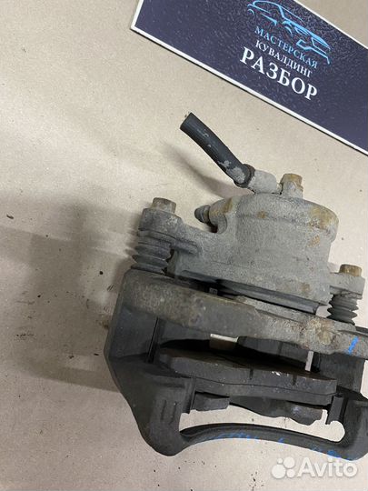 Тормозной суппорт передний левый Chevrolet lacetti