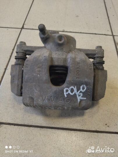 Суппорт тормозной передний правый Volkswagen Polo
