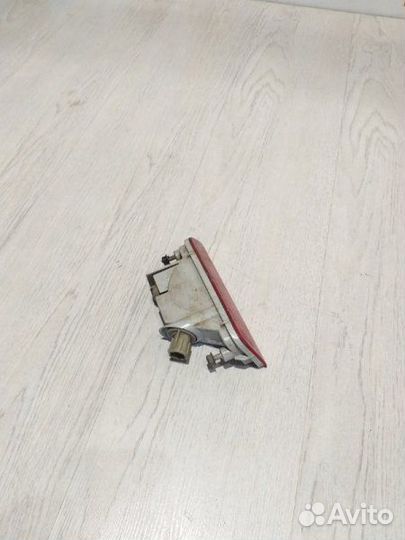 Катафот Отражатель заднего бампера Nissan almera G