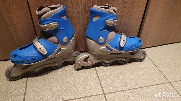 Роликовые коньки