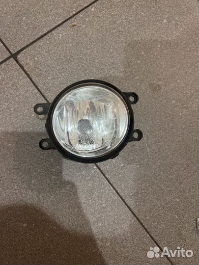 Фара противотуманная левая с рамкой