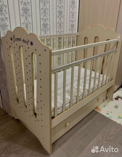 Детская кроватка с поперечным маятником
