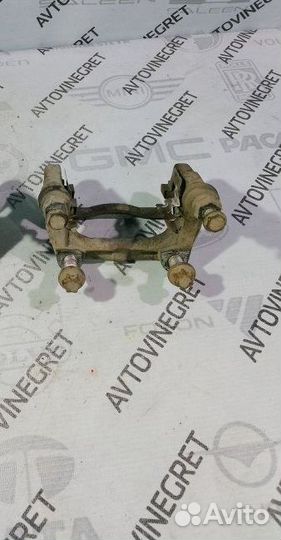 Скоба суппорта заднего Opel Astra H за штуку