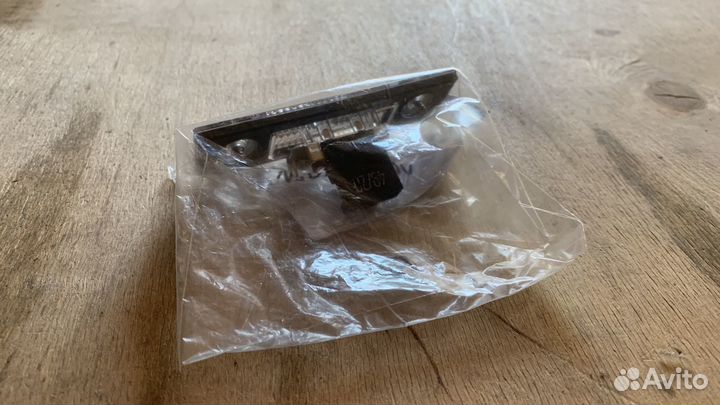 Фонарь освещения номерного знака skoda