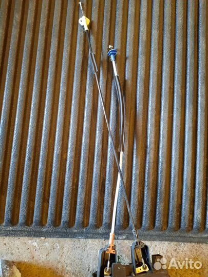 Тросик замка задней двери Opel Astra G