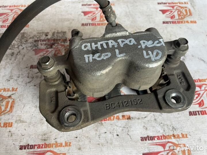 Суппорт тормозной передний левый Opel Antara С145