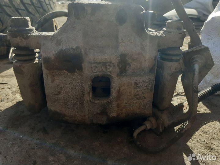 Суппорт тормозной Mitsubishi Space Wagon