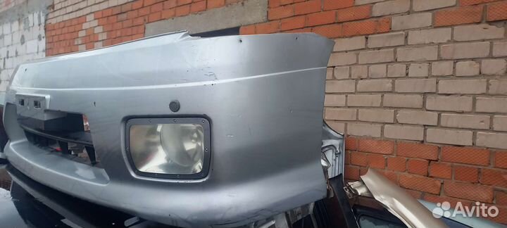 Передний бампер Nissan Serena c24