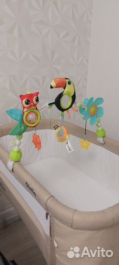 Дуга с игрушками