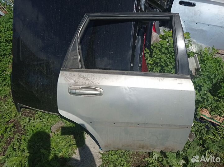 Дверь лачетти универсал