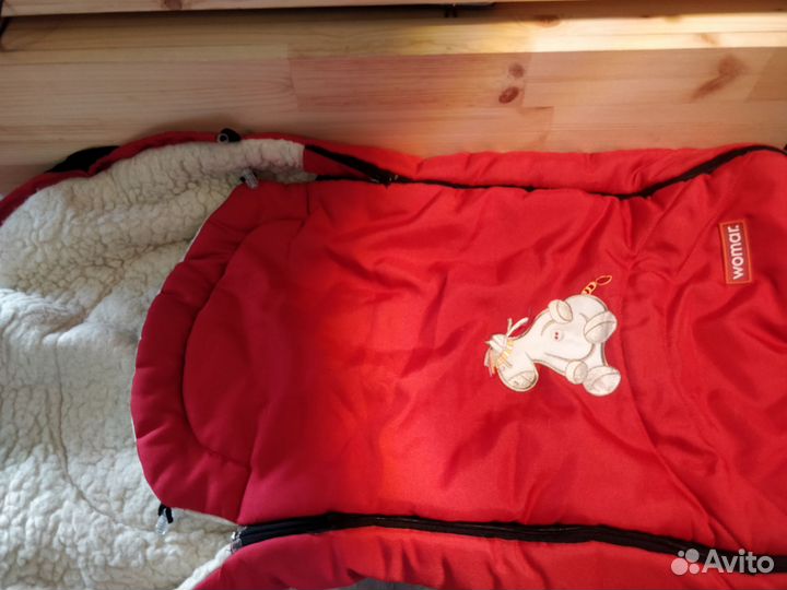 Меховой конверт в коляску womar