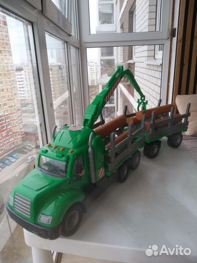 Лесовоз с прицепом брёвнами Полесье