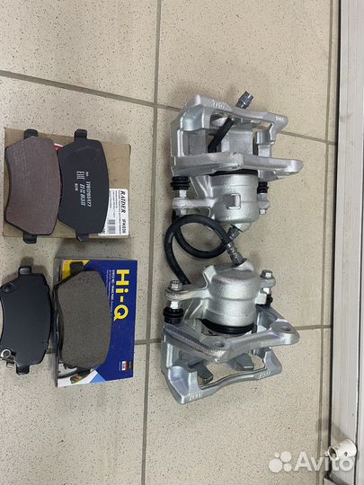 Тормозной суппорт в сборе на Ларгус Весту Кросс