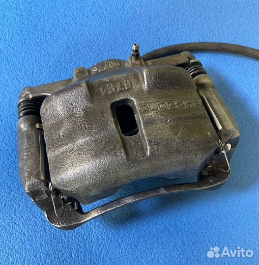 Суппорт тормозной перед. левый Nissan X-Trail T32