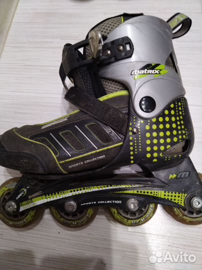 Роликовые коньки