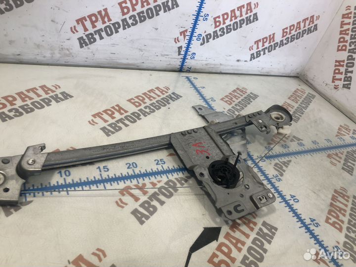 Стеклоподъемник электрический задней двери Лев